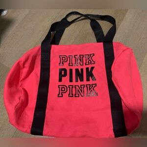 Victoria's Secret PINK duffle bag in coral pink and black.